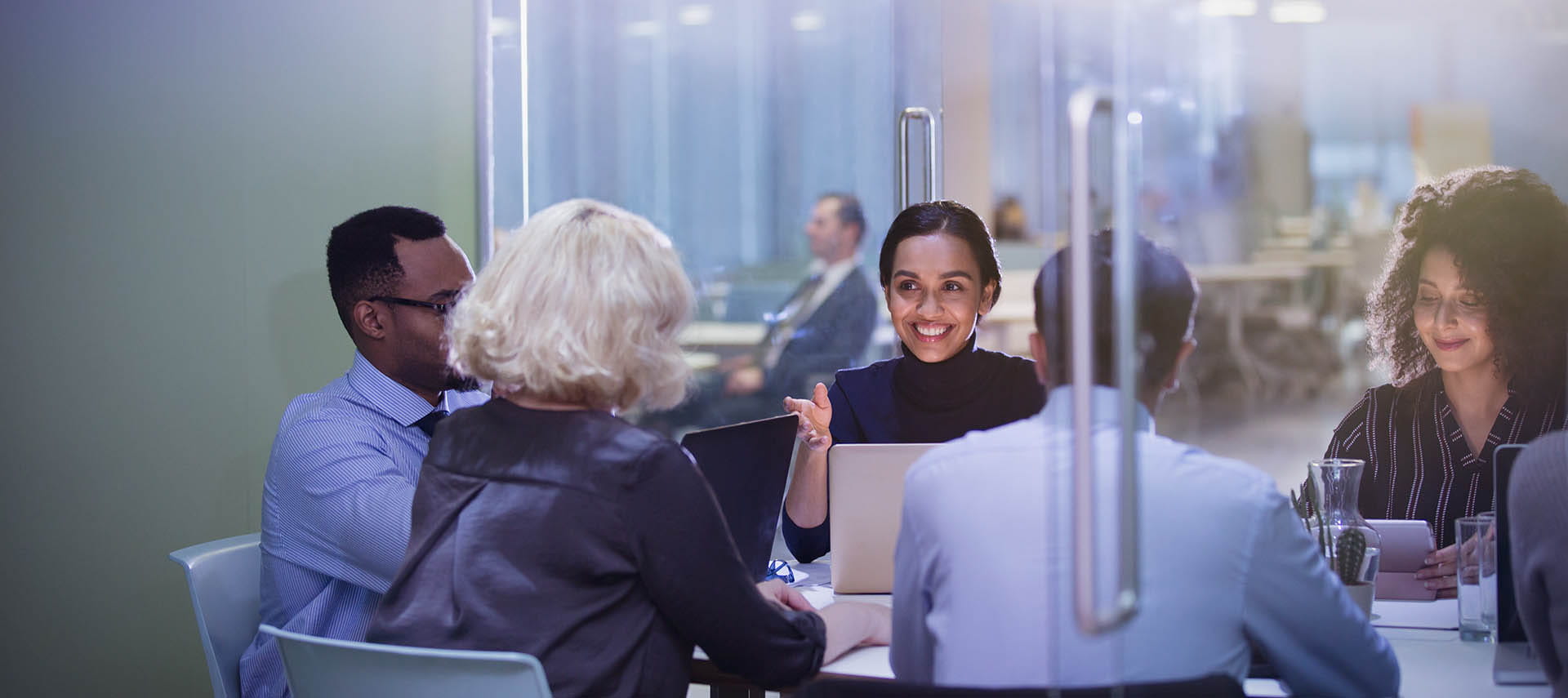 Business colleagues meeting with laptops.
